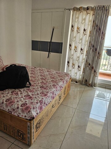 Bedroom in 3.5 BHK Apartment at Ansals Celebrity Greens, Sushant Golf City – for Rent
