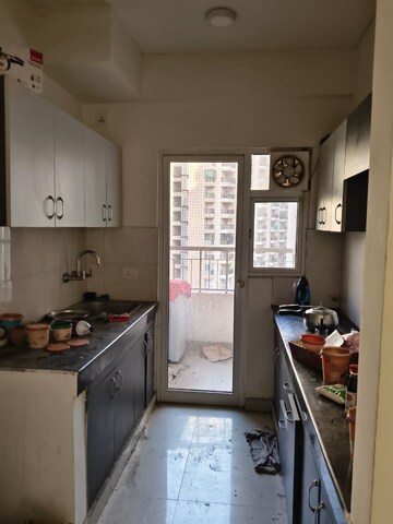 Kitchen in 2 BHK Apartment at VVIP Homes Meridian Tower, Sector 4 Greater Noida – for Rent