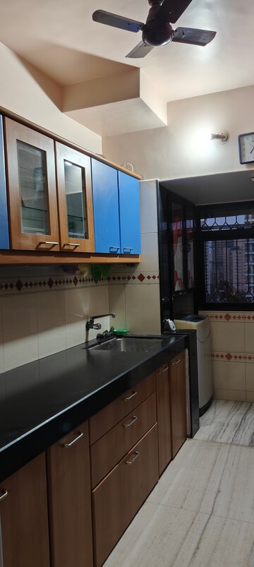 Kitchen in 2 BHK Apartment at Palash Towers, Andheri West – for Rent