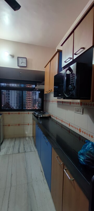 Kitchen in 2 BHK Apartment at Palash Towers, Andheri West – for Rent