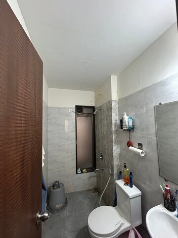 Bathroom in 3 BHK Apartment at Acme Ozone, Manpada – for Rent
