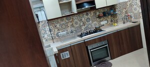 Kitchen in 2 BHK Apartment at Oshiwara Mhada, Andheri West – for Sale
