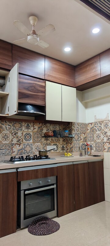 Kitchen in 2 BHK Apartment at Oshiwara Mhada, Andheri West – for Rent