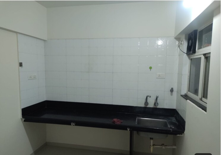 Kitchen, atrium-skyward 2 Bedroom 950 Sq.Ft. Apartment In Undri Pune 8716925