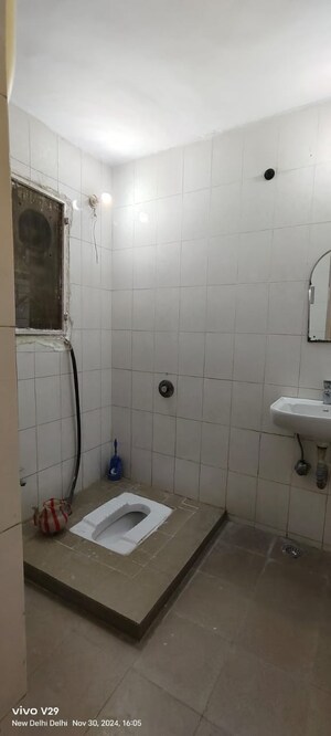 Bathroom in 3 BHK Apartment at RWA Jasola Sector 7, Jasola – for Sale