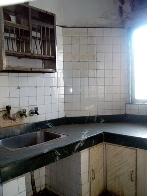 Kitchen in 3 BHK Apartment at RWA Jasola Sector 8 SFS Flat, Jasola – for Sale
