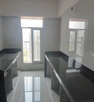 Kitchen in 2 BHK Apartment at Zee Ashtavinayak, Andheri West – for Sale