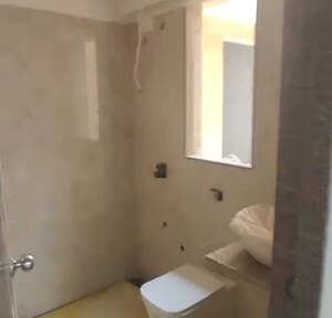 Bathroom in 2 BHK Apartment at Zee Ashtavinayak, Andheri West – for Sale