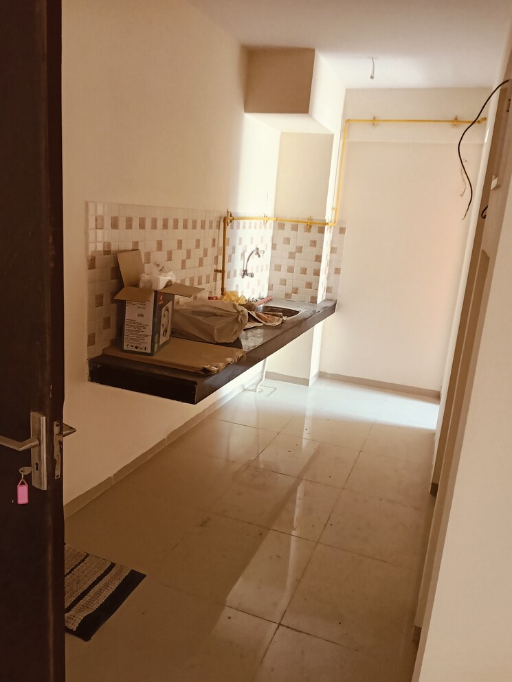 Kitchen, wave-dream-homes 2 Bedroom 808 Sq.Ft. Apartment In Wave City Ghaziabad 8717380