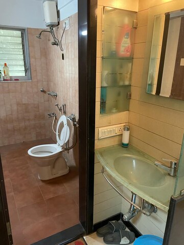 Bathroom in 1 BHK Apartment at Dheeraj Uphar CHS. LTD., Malad East – for Rent