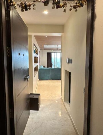 Living Room in 2.5 BHK Apartment at T Bhimjyani Neelkanth Woods, Manpada – for Rent