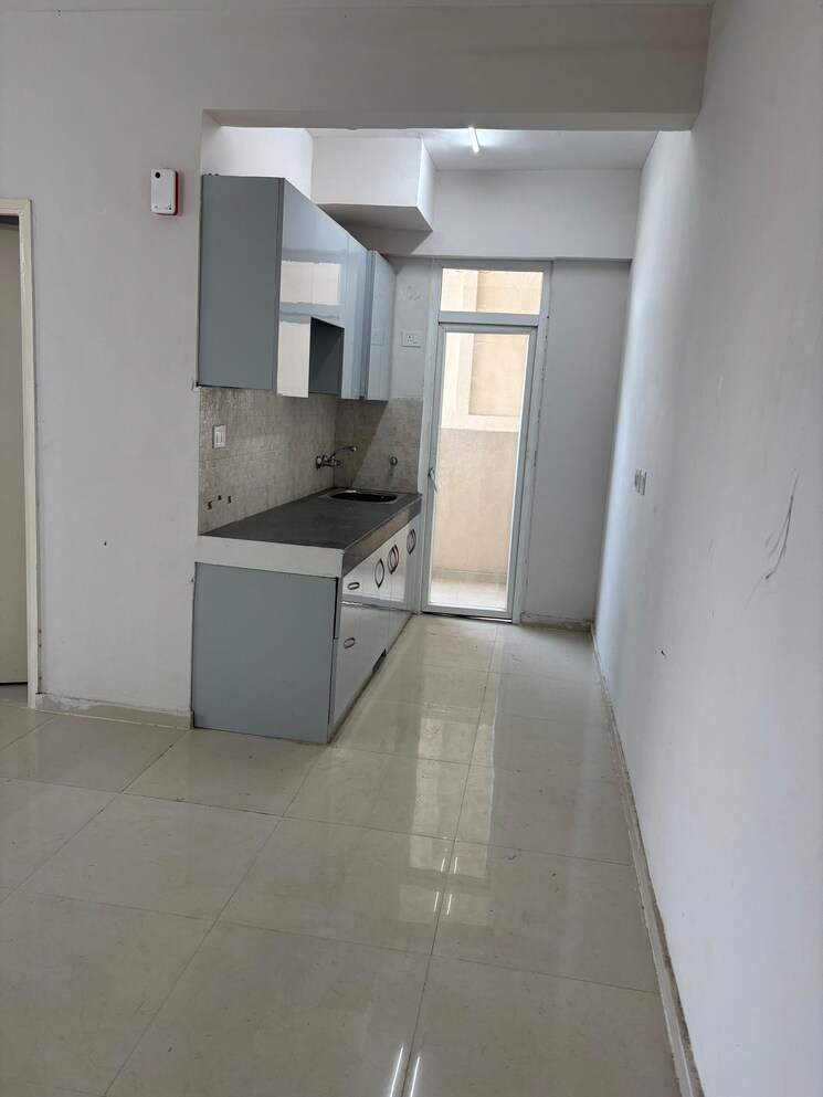 Kitchen, signature-global-the-millennia 2 Bedroom 1180 Sq.Ft. Apartment In Sector 37d Gurgaon 8717613