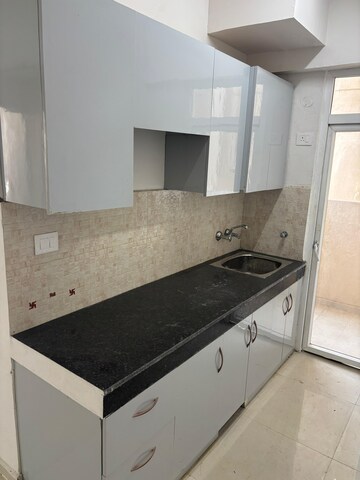 Kitchen in 2 BHK Apartment at Signature Global The Millennia, Sector 37d – for Rent