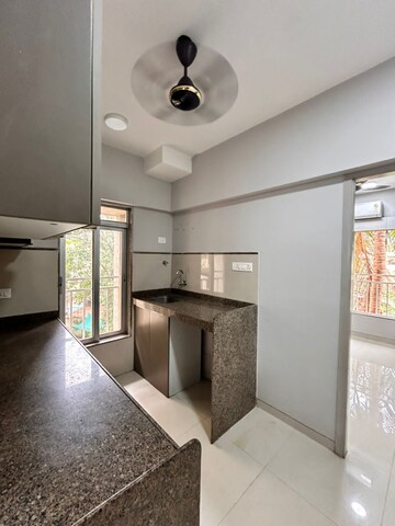 Kitchen in 2 BHK Apartment at Riddhi Tower, Malad East – for Rent