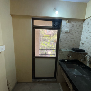 Kitchen in 2 BHK Apartment at Chinmay CHS Kandivali, Ashok Nagar – for Sale