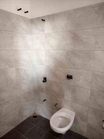 Bathroom in 2 BHK Apartment at Goyal Orchid Valley, Shela – for Rent