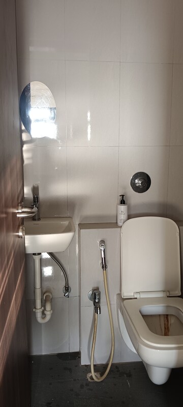 Bathroom in 1 BHK Apartment at Sethia Imperial Avenue, Malad East – for Rent
