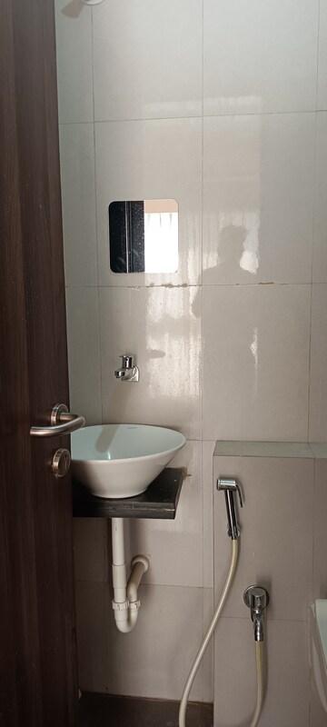 Bathroom in 1 BHK Apartment at Sethia Imperial Avenue, Malad East – for Rent