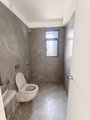 Bathroom in 4 BHK Apartment at Prahlad Nagar – for Sale