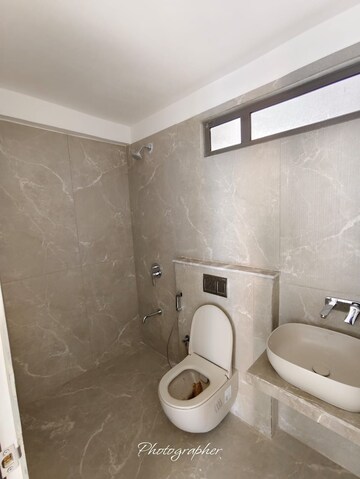 Bathroom in 4 BHK Apartment at Prahlad Nagar – for Sale
