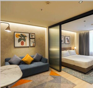 Living Room in Studio Apartment at NR Green Woods, Thanisandra – for Sale