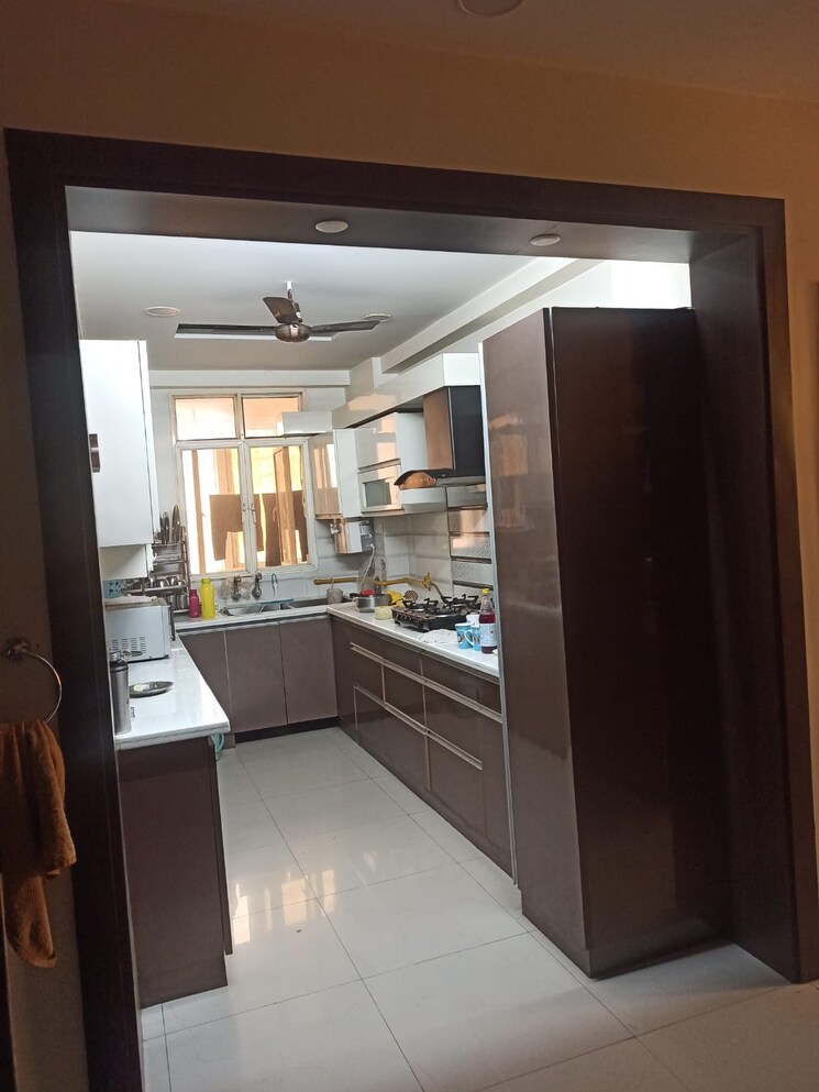Kitchen, gaurs-green-avenue 4 Bedroom 1993 Sq.Ft. Apartment In Abhay Khand Ghaziabad 8719034
