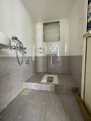 Bathroom in 1 BHK Apartment at Seven Eleven Apna Ghar II, Mira Road – for Rent