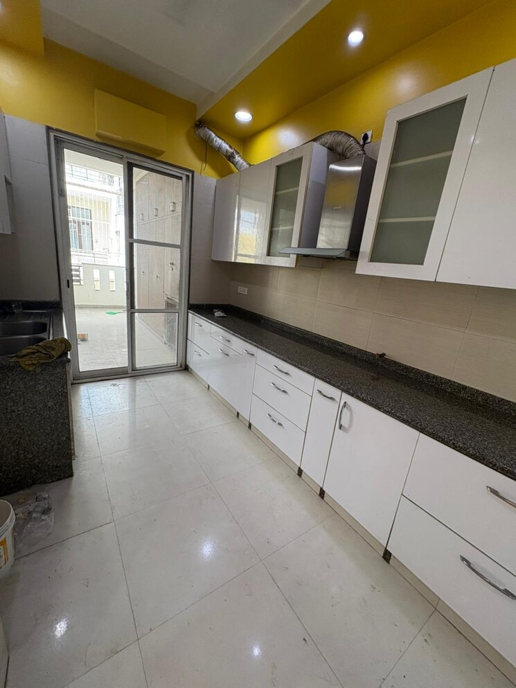 Kitchen, ansal-highland-park 3 Bedroom 1940 Sq.Ft. Apartment In Sector 103 Gurgaon 8720695