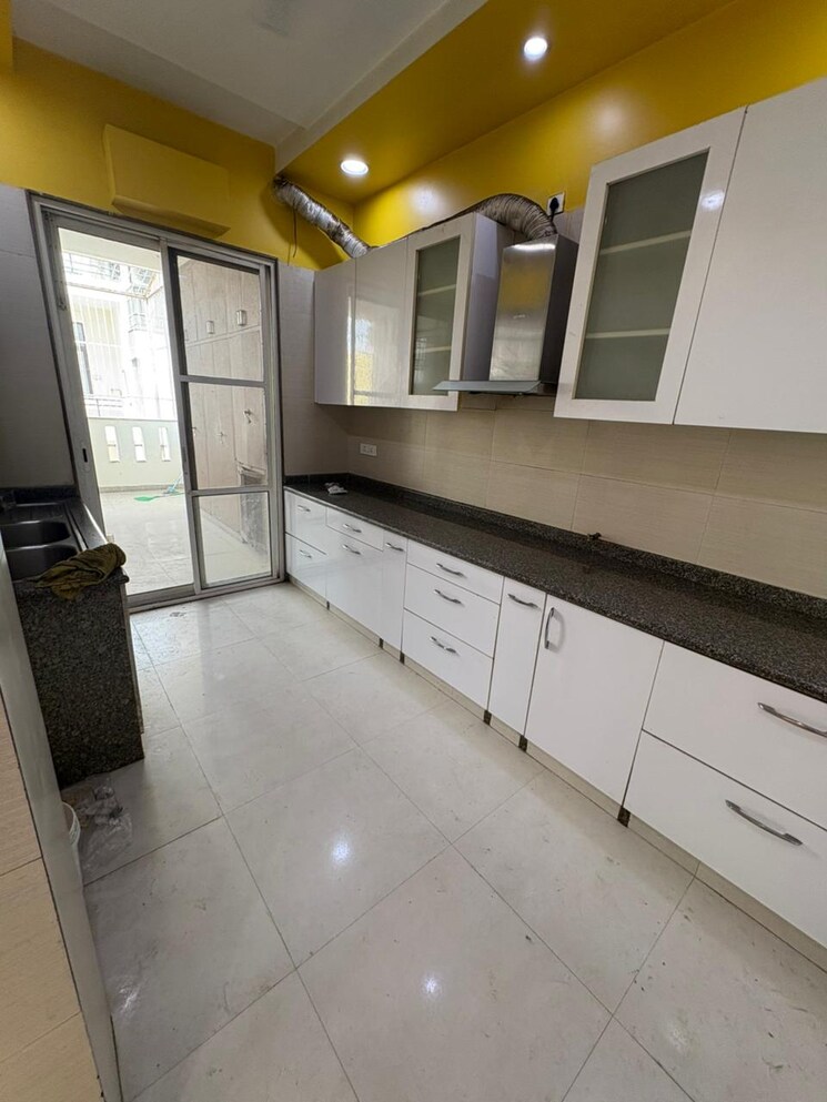 Kitchen, ansal-highland-park 3 Bedroom 1940 Sq.Ft. Apartment In Sector 103 Gurgaon 8720695