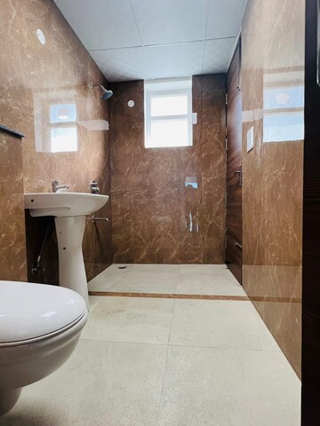 Bathroom in 3 BHK Apartment at Motia Harmony Greens, Kishanpura – for Sale