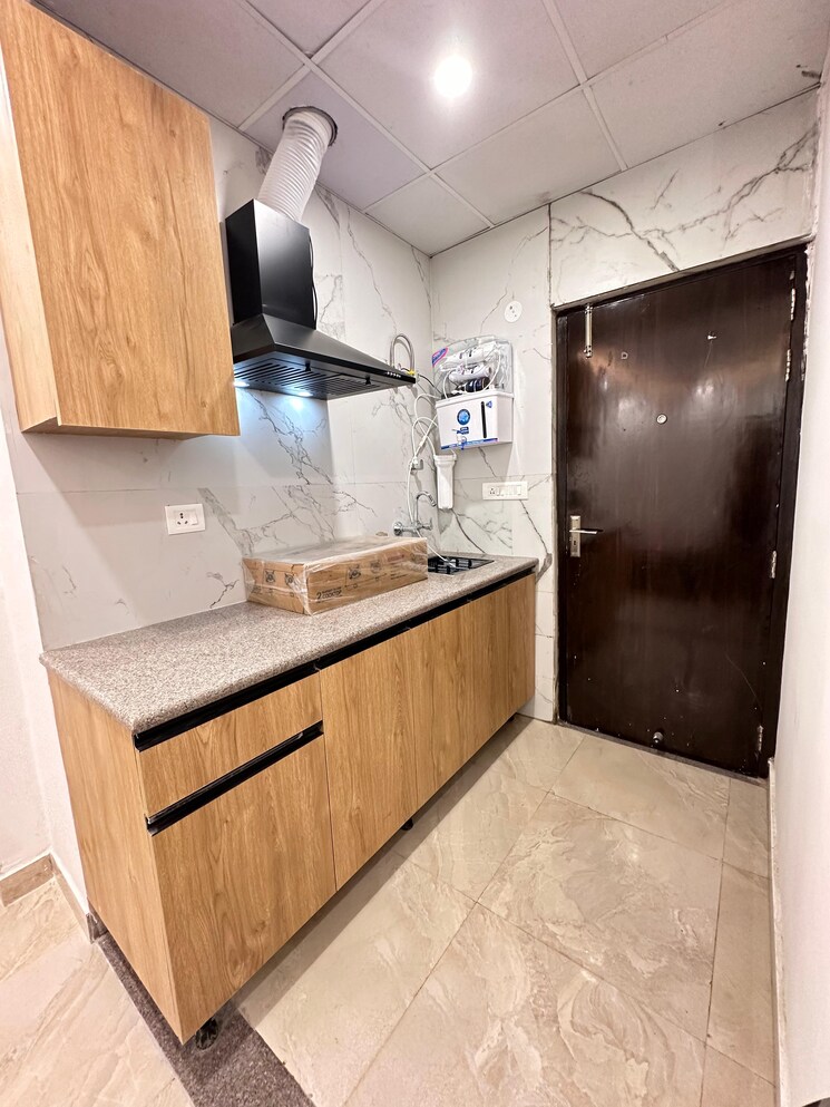 Kitchen, sector 27 1 RK 600 Sq.Ft. Builder Floor In Sector 27 Gurgaon 8720526