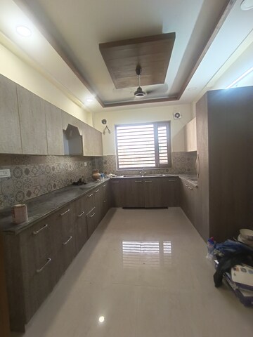 Kitchen in 4 BHK Builder Floor at Srishti Greenfield Homes, Green Fields Colony – for Rent