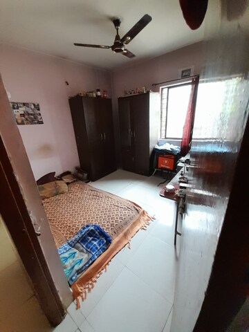 Bedroom in 2 BHK Apartment at Laxmi Nagar Society, Dhanori – for Rent