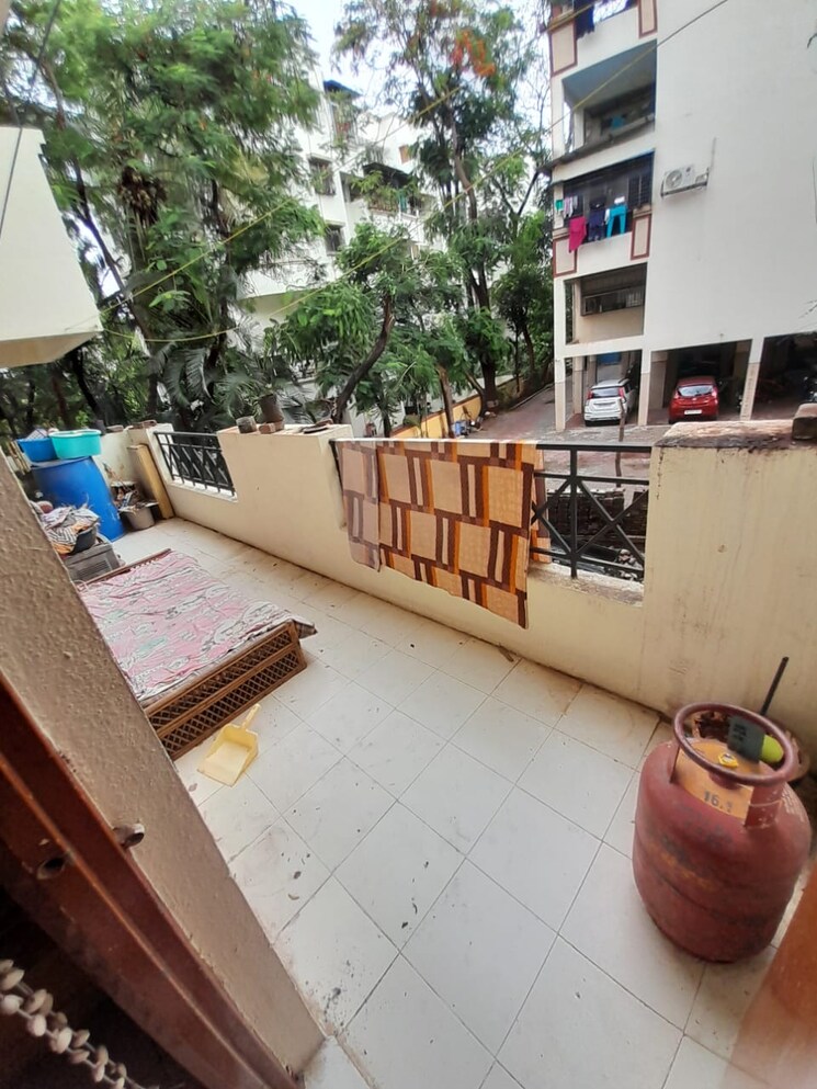 Balcony, laxmi-nagar-society 2 Bedroom 870 Sq.Ft. Apartment In Dhanori Pune 8721211