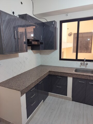 Kitchen in 3 BHK Apartment at Shalimar Mannat, Faizabad Road – for Sale