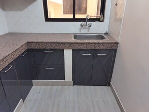 Kitchen in 3 BHK Apartment at Shalimar Mannat, Faizabad Road – for Sale