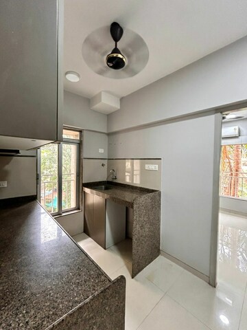 Kitchen in 2 BHK Apartment at K Raheja Heights, Malad East – for Sale