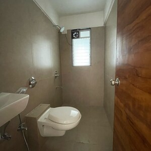 Bathroom in 1 BHK Apartment at Je And Vee Om Trimurti, Dindoshi – for Sale