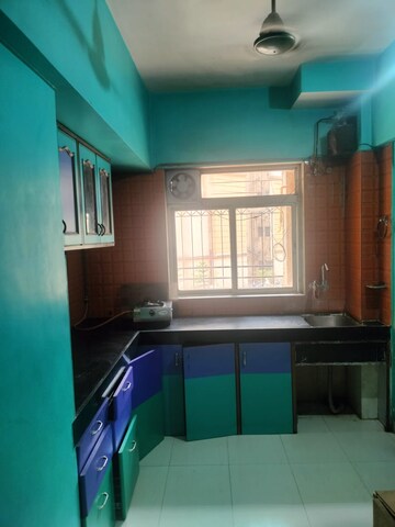 Kitchen in 1 BHK Apartment at Krishna Greenland Park Vastu Federation, Ghodbunder Road – for Rent