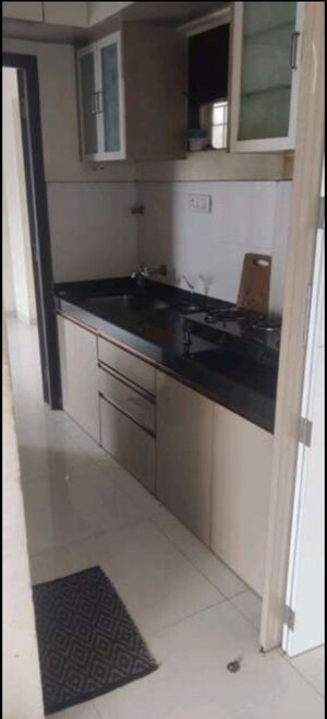 Kitchen in 1 BHK Apartment at Squarefeet Joy square, Kasarvadavali – for Sale