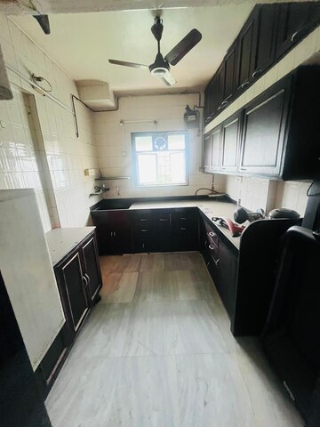 Kitchen in 2 BHK Apartment at Rajshree Dham CHS, Uthalsar – for Rent
