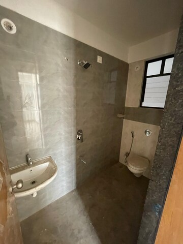 Bathroom in 2 BHK Apartment at Swaraaj Heights, Punawale – for Rent