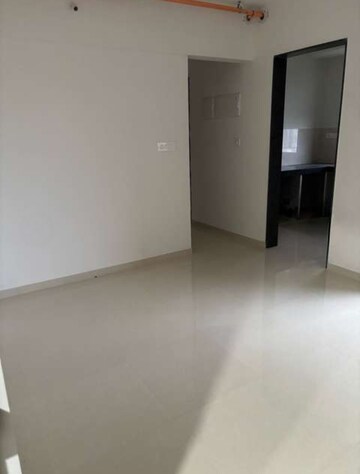 Living Room in 2 BHK Apartment at Runwal Eirene, Balkum Pada – for Rent