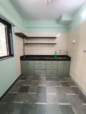 Kitchen in 1 BHK Apartment at Veda CHS, Ic Colony – for Sale