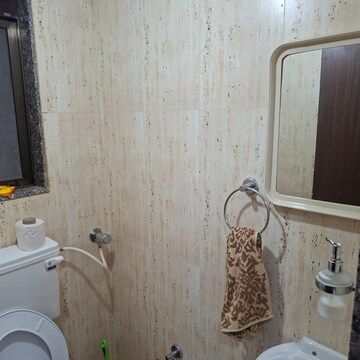 Bathroom in 2 BHK Apartment at Lotus Unity, Versova – for Rent