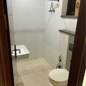 Bathroom in 3 BHK Builder Floor at Green Park – for Sale