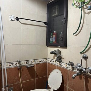 Bathroom in 2.5 BHK Apartment at Kalpa Taru Siddhachal III, Vasant Vihar – for Sale