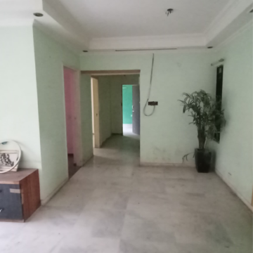 Living Room in 2.5 BHK Apartment at Kalpa Taru Siddhachal III, Vasant Vihar – for Sale