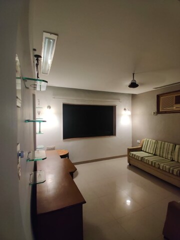 Living Room in 1 BHK Apartment at Royal Tower CHS Ltd, Borivali West – for Rent