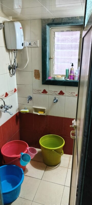 Bathroom in 1 BHK Apartment at Royal Tower CHS Ltd, Borivali West – for Rent